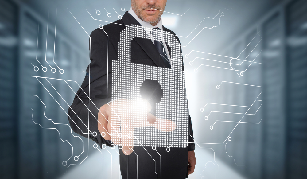 Businessman selecting a futuristic padlock with a data center on the background Businessman selecting a futuristic padlock with a data center on the background